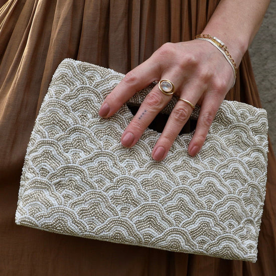 BAG Cut Out Handle Clutch in Ivory and Silver Waves