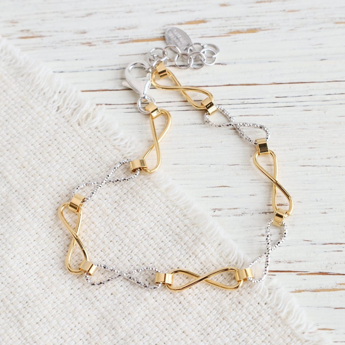 Sterling Silver & Yellow Gold Plated Infinity Bracelet – Dandelion
