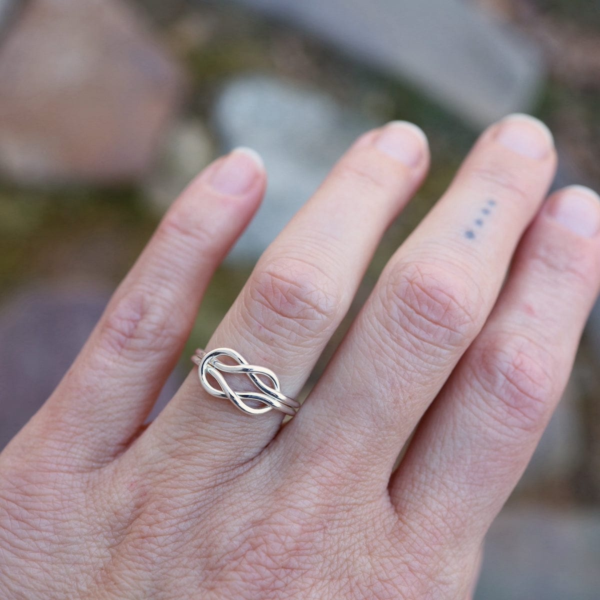 Double infinity knot fashion ring