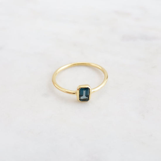 RNG-VRM Vertical Bezel Set Emerald Cut London Blue Topaz Ring