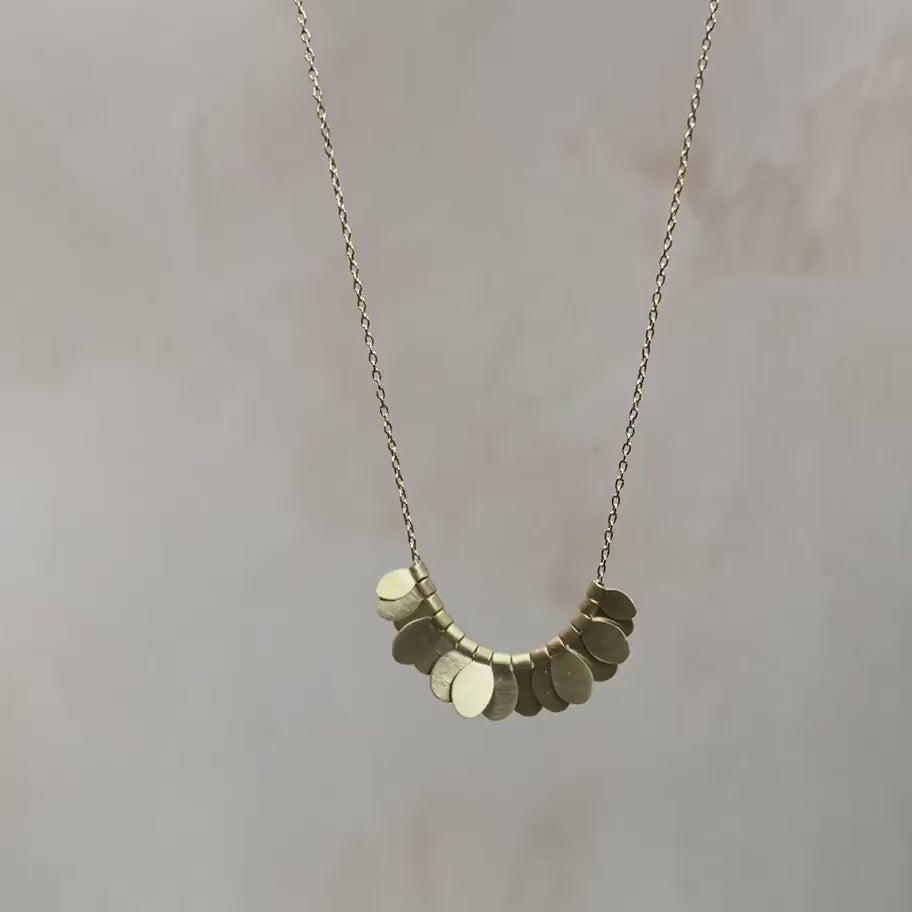 Load and play video in Gallery viewer, Tiny Songbird Arc Necklace
