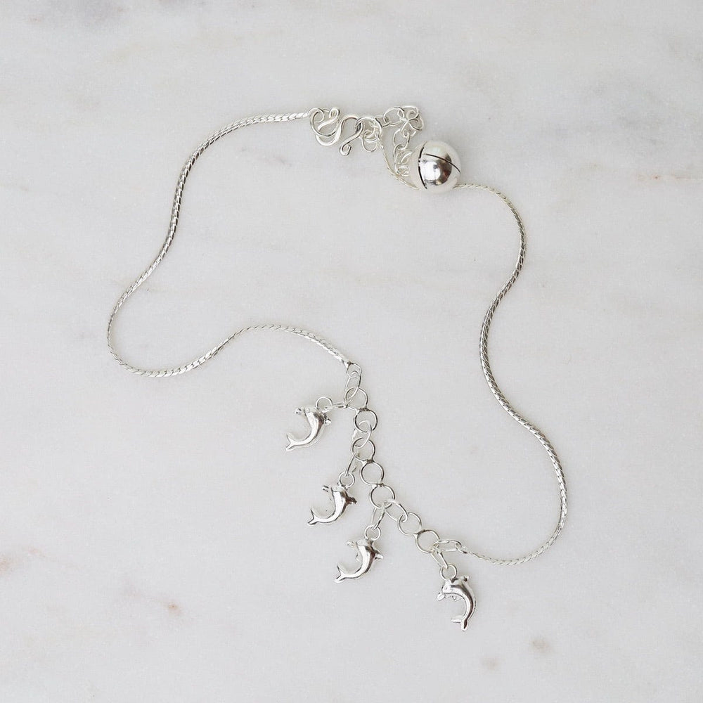 
                      
                        ANK Dangling Dolphins Anklet
                      
                    