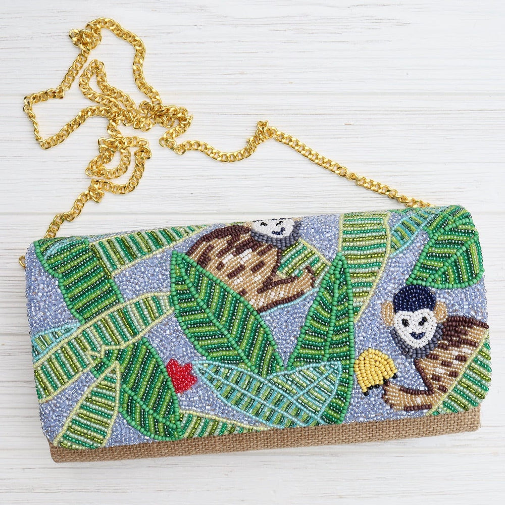 
                      
                        BAG Half Flap Natural Clutch in Beaded Monkeys
                      
                    