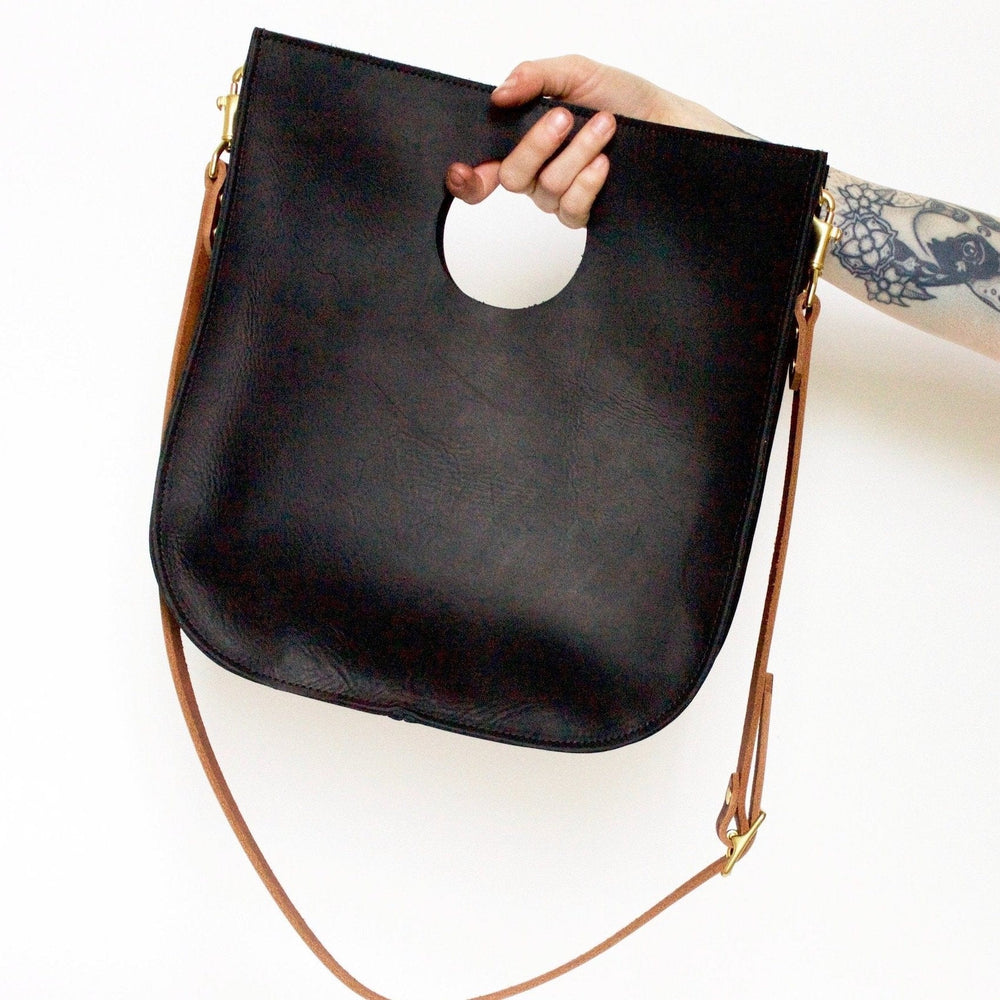 
                      
                        BAG The Alice Tote in Black & Cognac
                      
                    