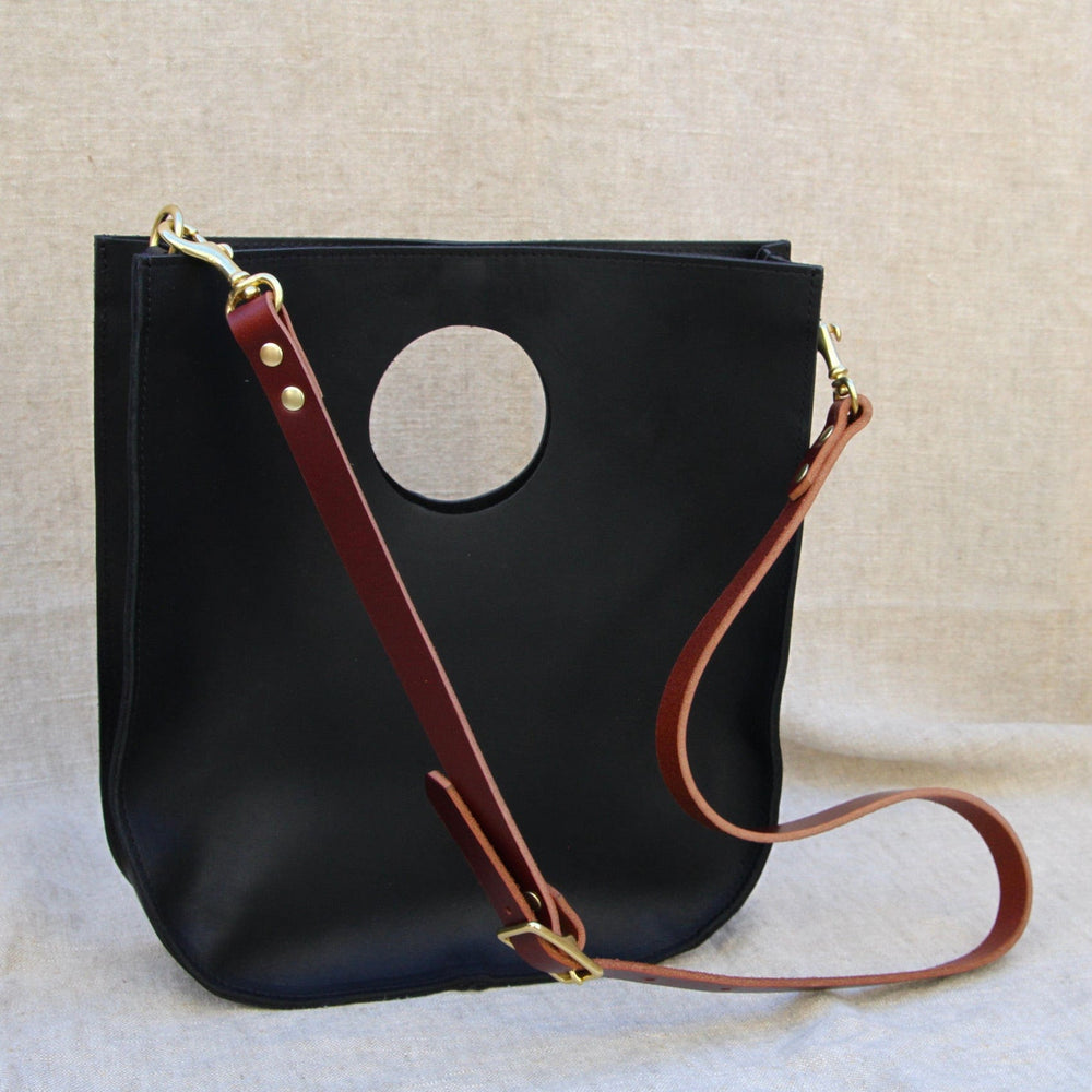 
                      
                        BAG The Alice Tote in Black & Cognac
                      
                    