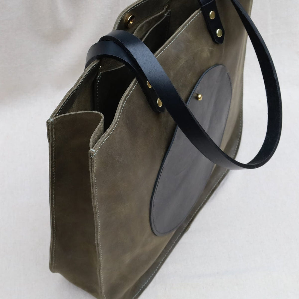 
                      
                        BAG The Isabel Tote in Juniper & Black
                      
                    