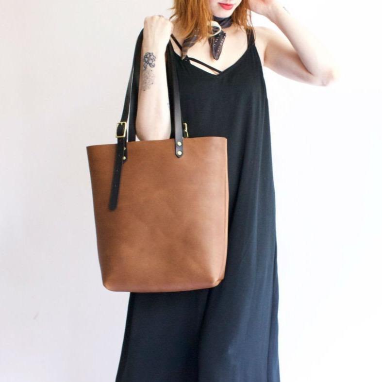 
                      
                        BAG The Leona Tote in Cocoa & Black
                      
                    