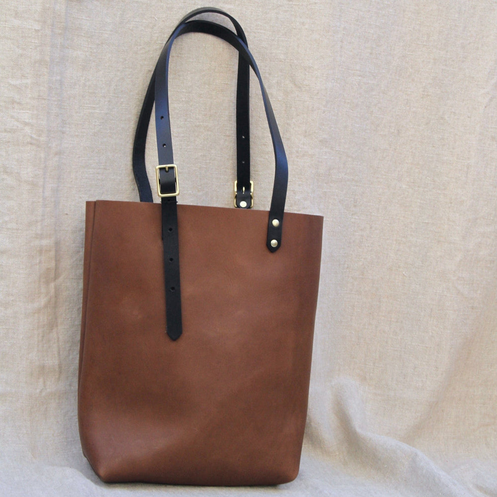 
                      
                        BAG The Leona Tote in Cocoa & Black
                      
                    