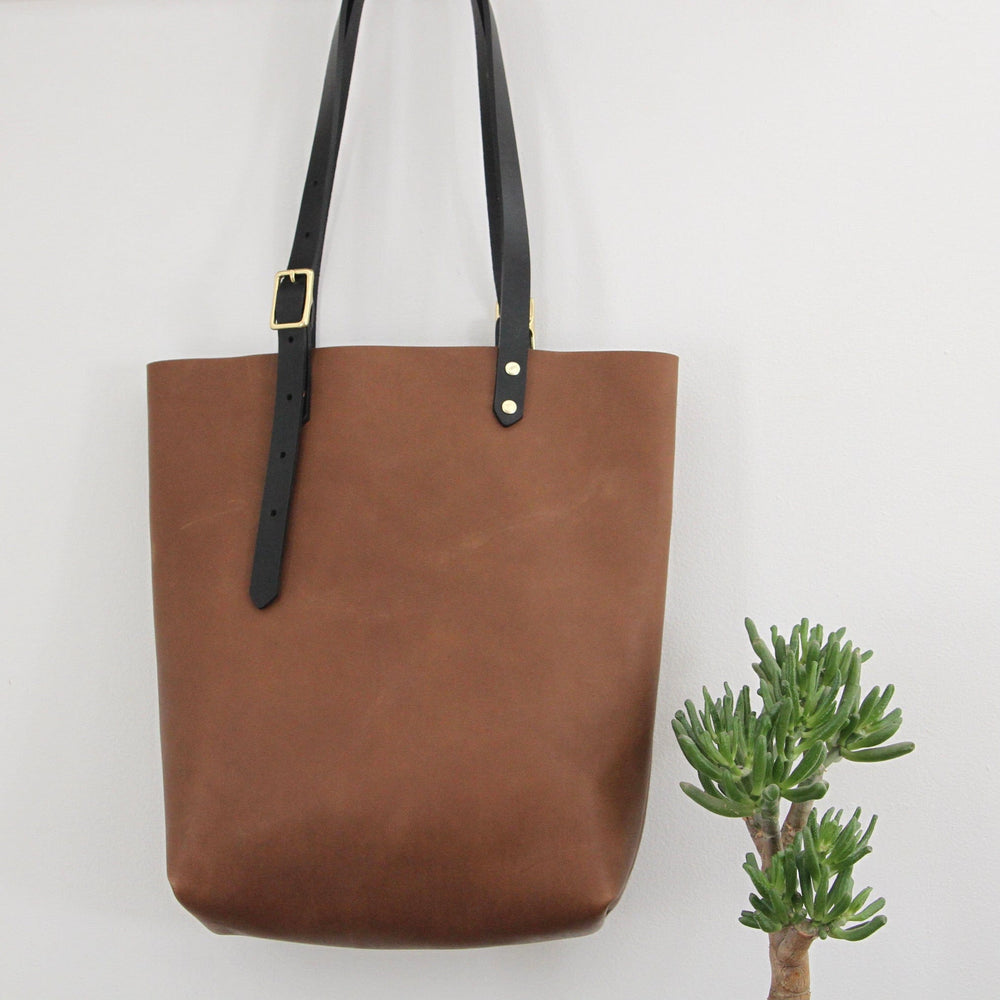 
                      
                        BAG The Leona Tote in Cocoa & Black
                      
                    