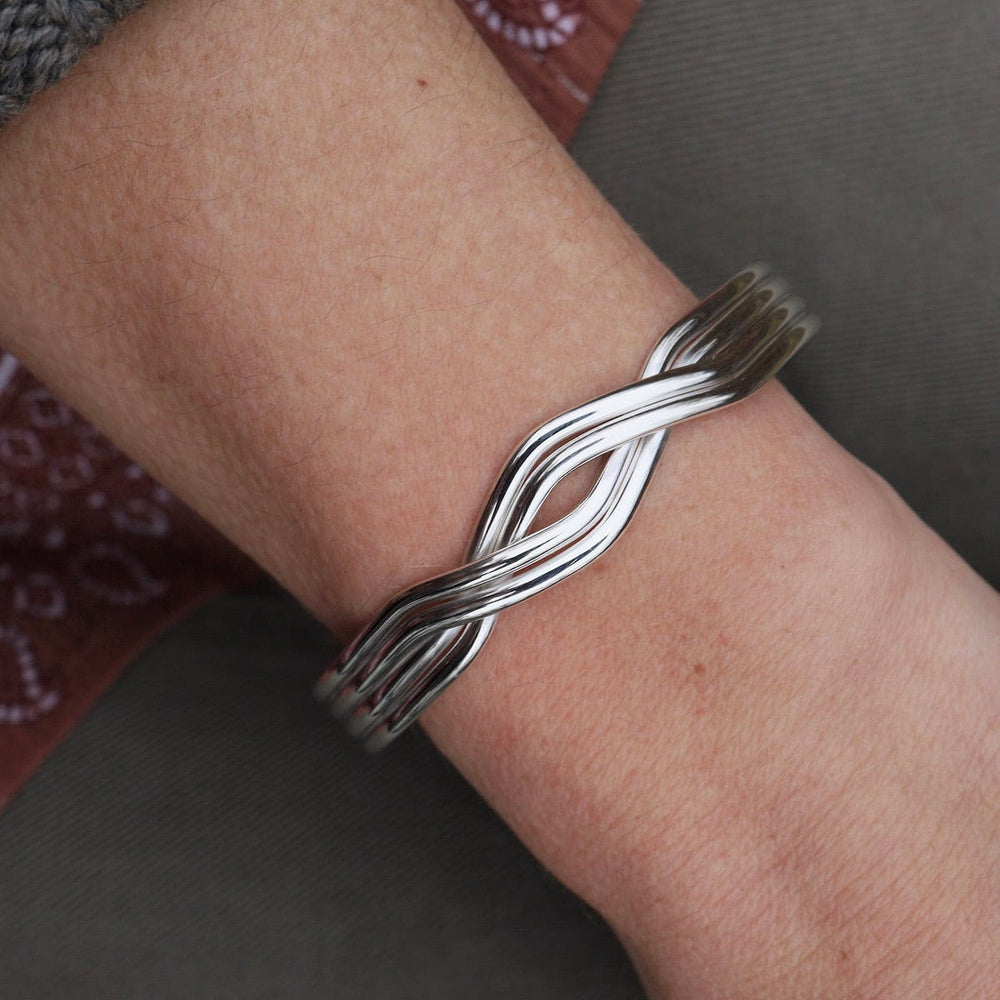 
                      
                        BRC 1/2" 4 Strand Overlapping Sterling Silver Cuff
                      
                    