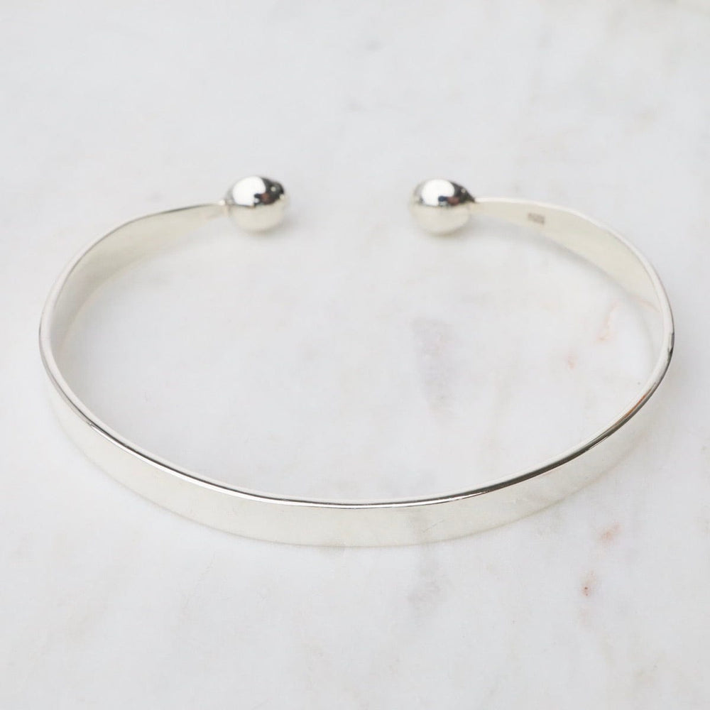 
                      
                        BRC 1/2" Simple Sterling Silver Cuff with Ball Ends
                      
                    