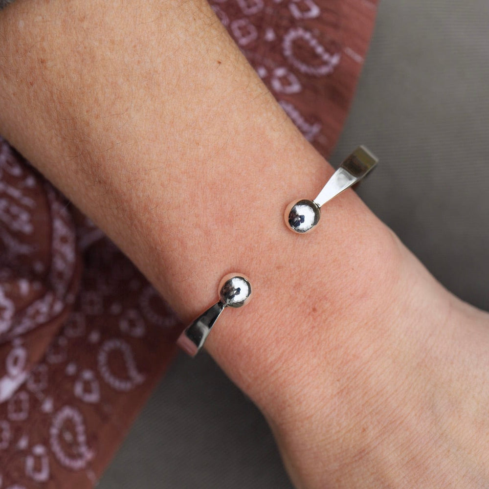 
                      
                        BRC 1/2" Simple Sterling Silver Cuff with Ball Ends
                      
                    