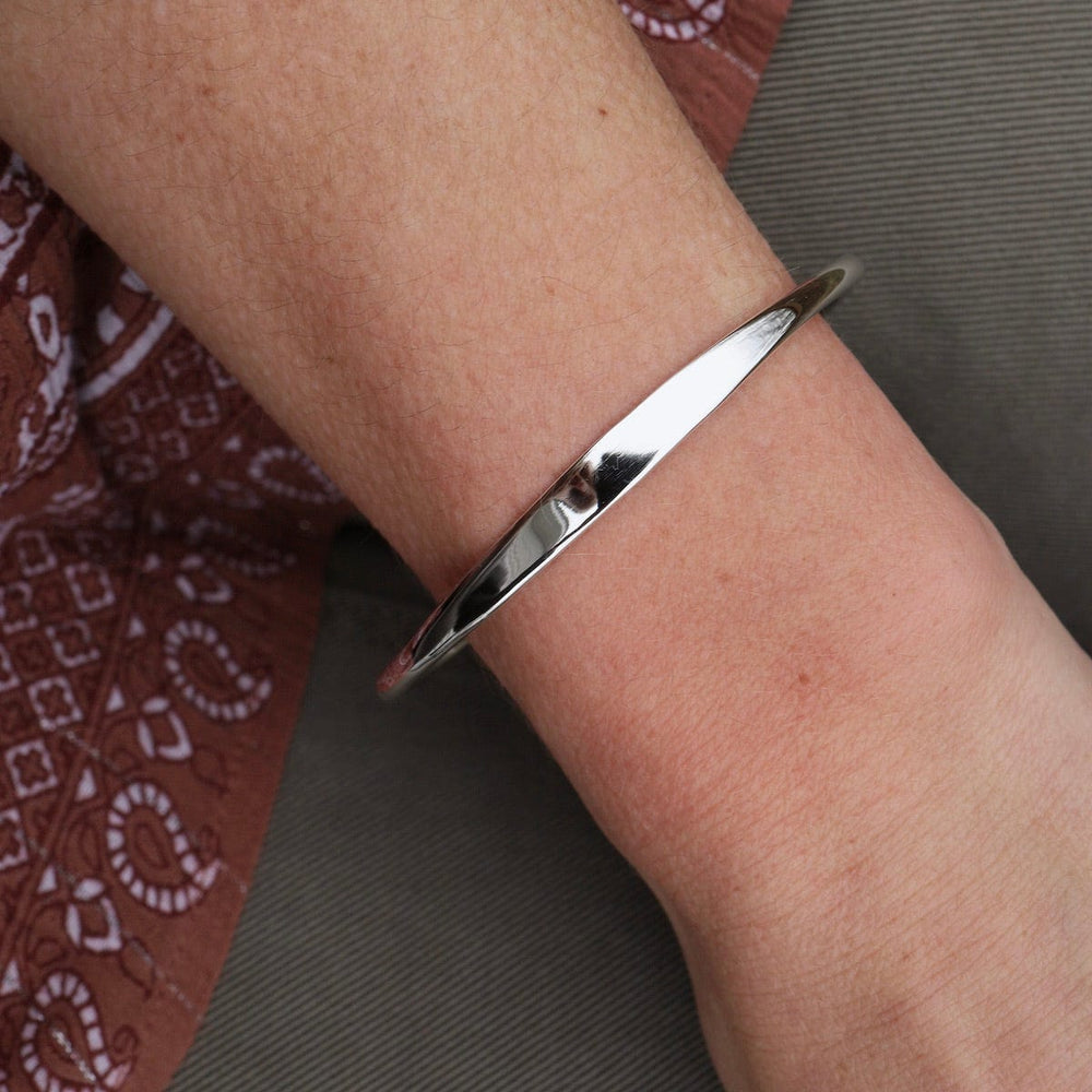 
                      
                        BRC 1/2" Simple Tapered Heavy Sterling Silver Cuff
                      
                    