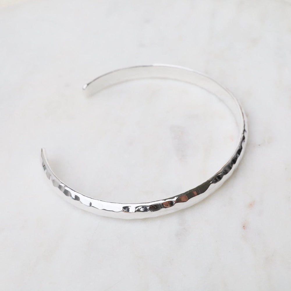 
                  
                    BRC 1/4" Simple Hammered Sterling Silver Cuff
                  
                