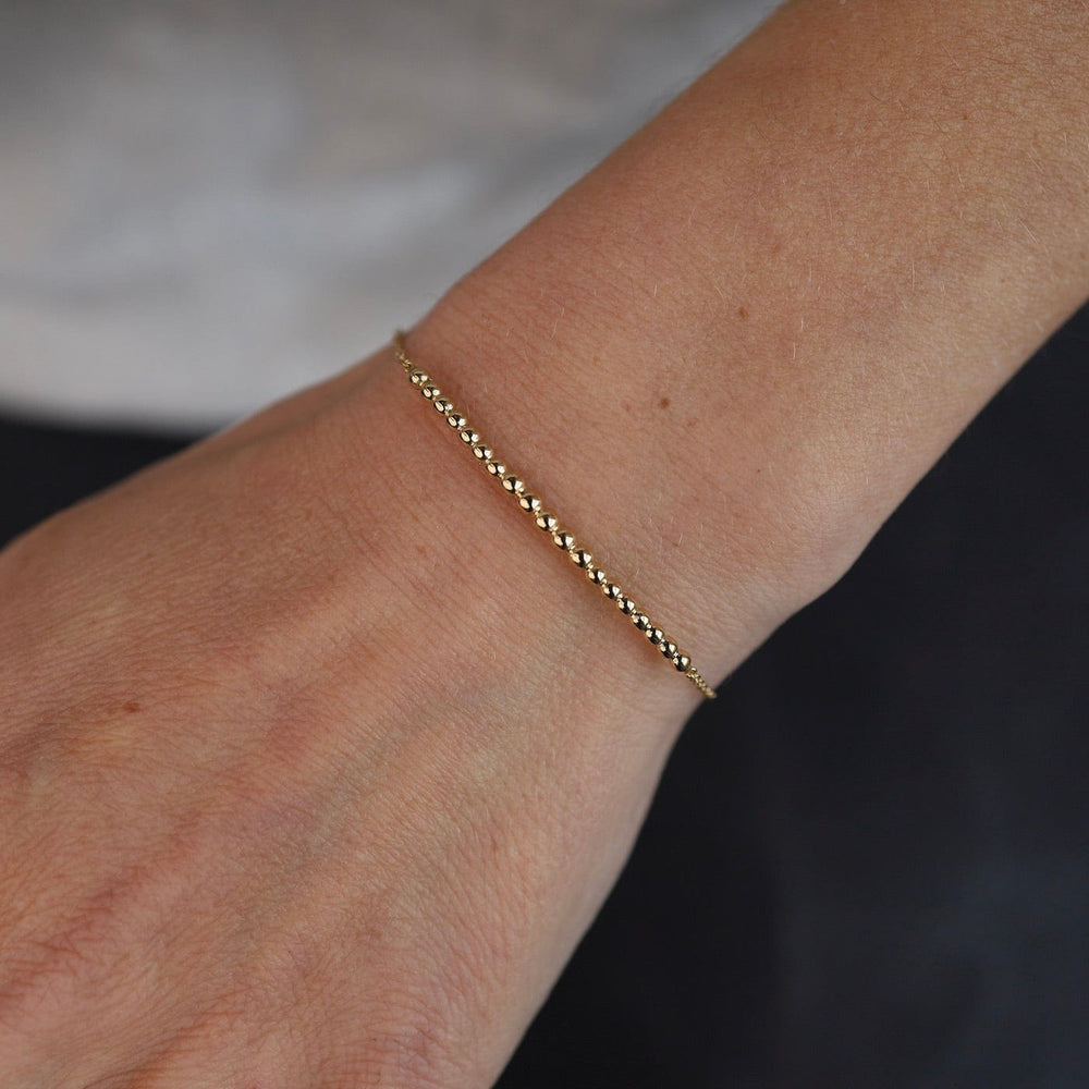 BRC-14K 14k Curved Beaded Bar Bracelet