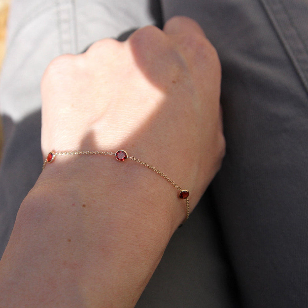 BRC-14K 14k Garnet Station Bracelet