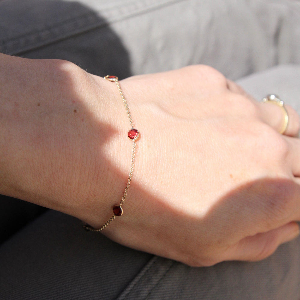 
                  
                    BRC-14K 14k Garnet Station Bracelet
                  
                