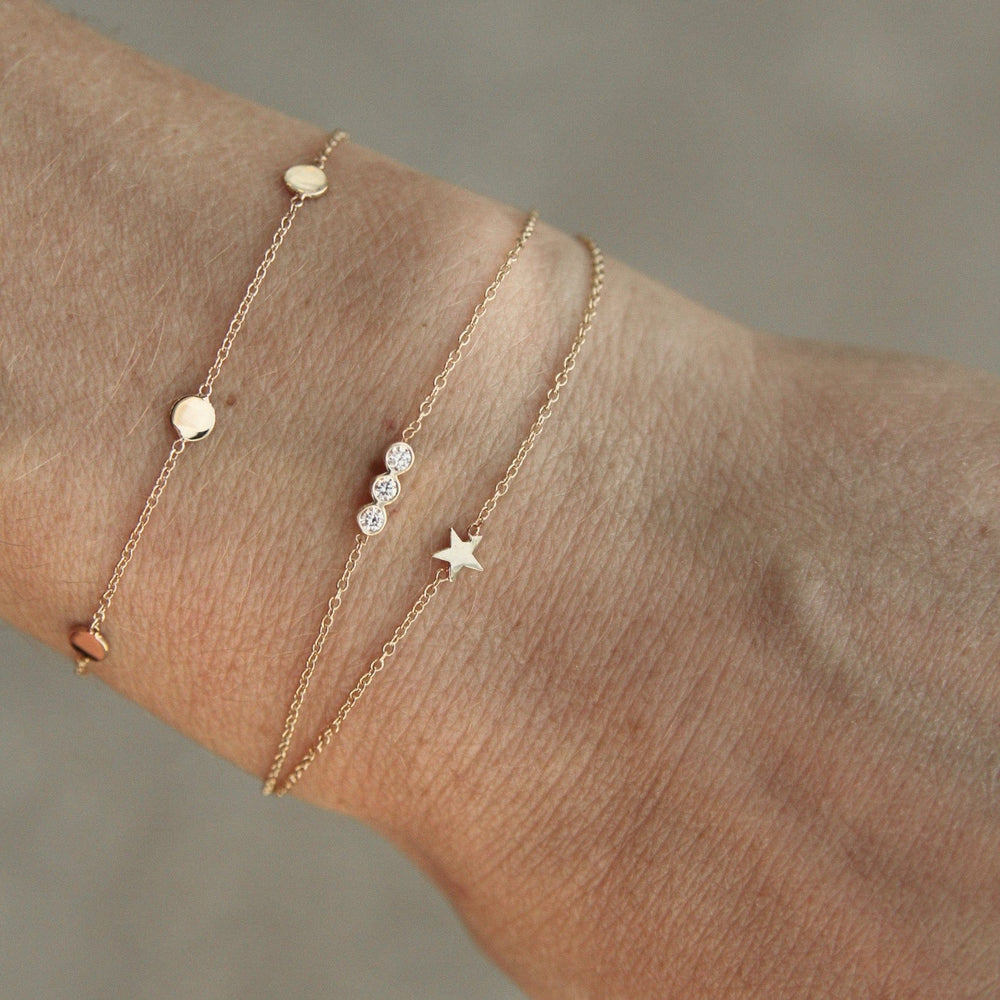 
                  
                    BRC-14K 14K Itty Bitty Star Bracelet
                  
                