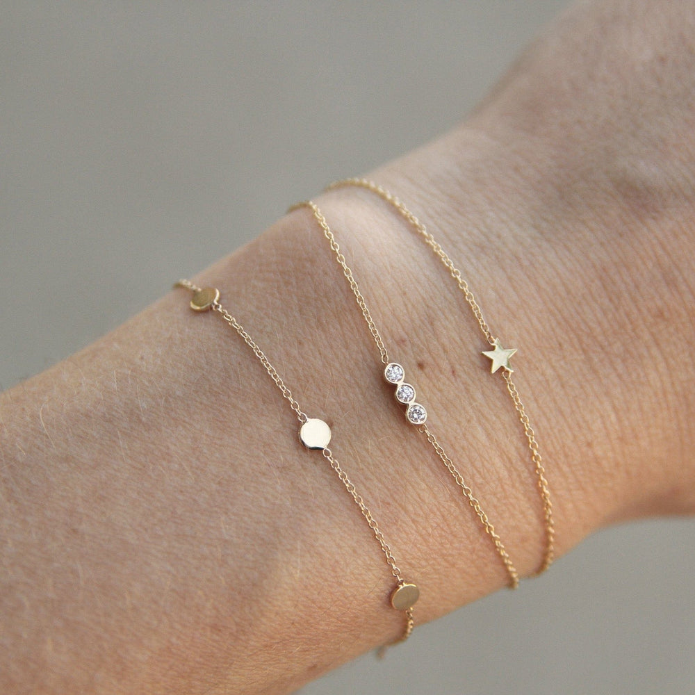 
                  
                    BRC-14K 14K Itty Bitty Star Bracelet
                  
                