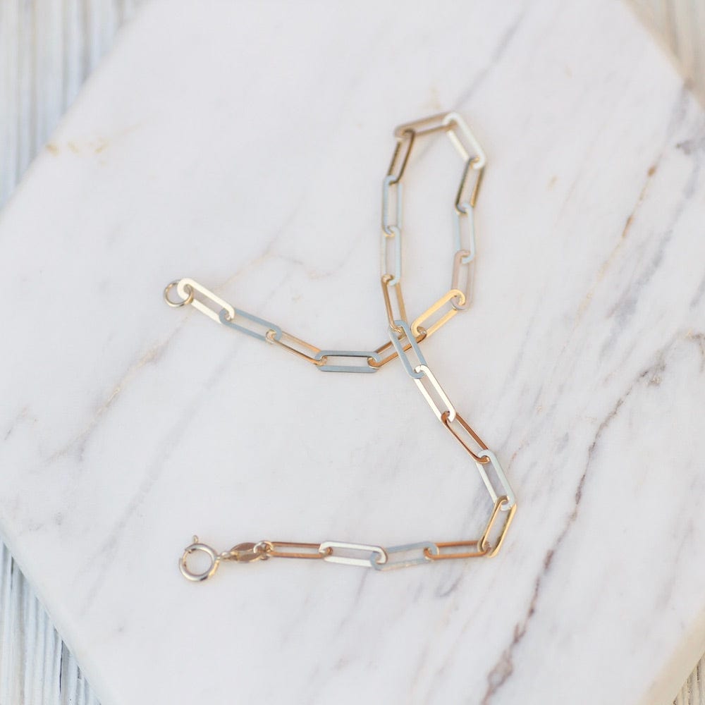 
                      
                        BRC-14K 14K Yellow Gold Mini Paperclip Chain Bracelet
                      
                    