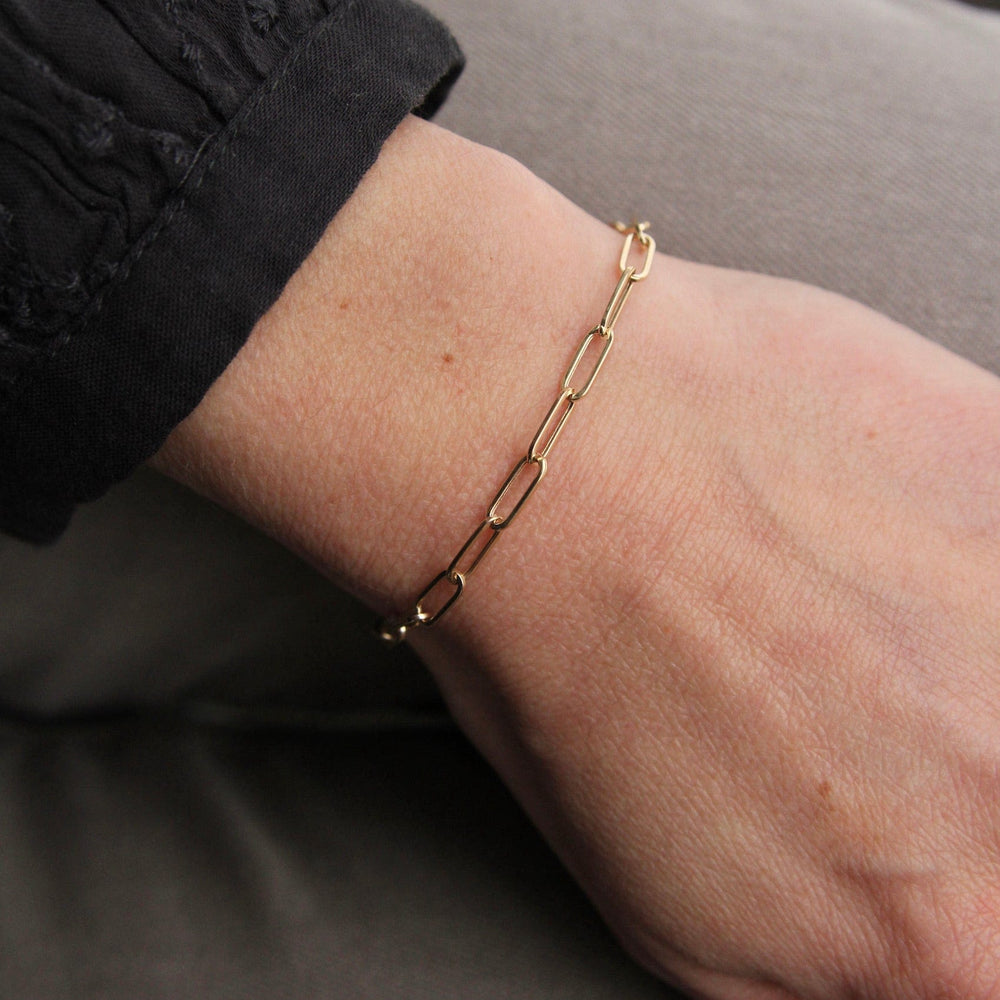 
                      
                        BRC-14K 14k Yellow Gold Mini Paperclip Chain Bracelet
                      
                    