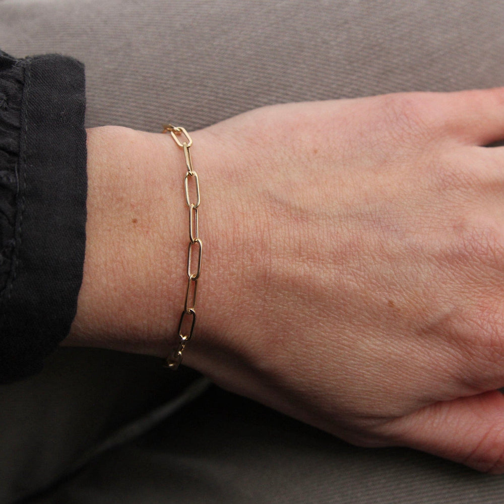 
                      
                        BRC-14K 14k Yellow Gold Mini Paperclip Chain Bracelet
                      
                    