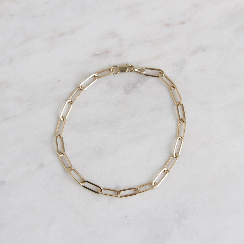 
                      
                        BRC-14K 14k Yellow Gold Mini Paperclip Chain Bracelet
                      
                    