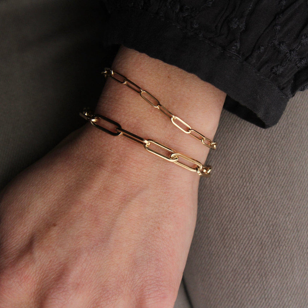 
                      
                        BRC-14K 14k Yellow Gold Mini Paperclip Chain Bracelet
                      
                    