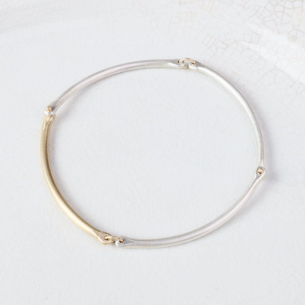 
                  
                    BRC-14K Rivet and Ring Bangle
                  
                