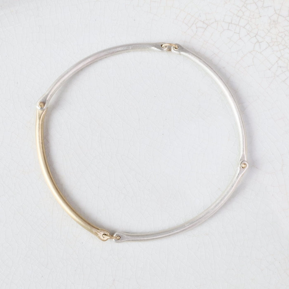 
                  
                    BRC-14K Rivet and Ring Bangle
                  
                