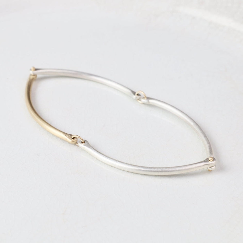 
                  
                    BRC-14K Rivet and Ring Bangle
                  
                