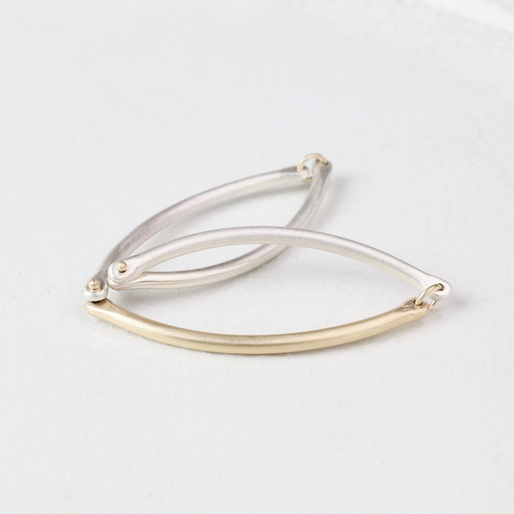 
                  
                    BRC-14K Rivet and Ring Bangle
                  
                