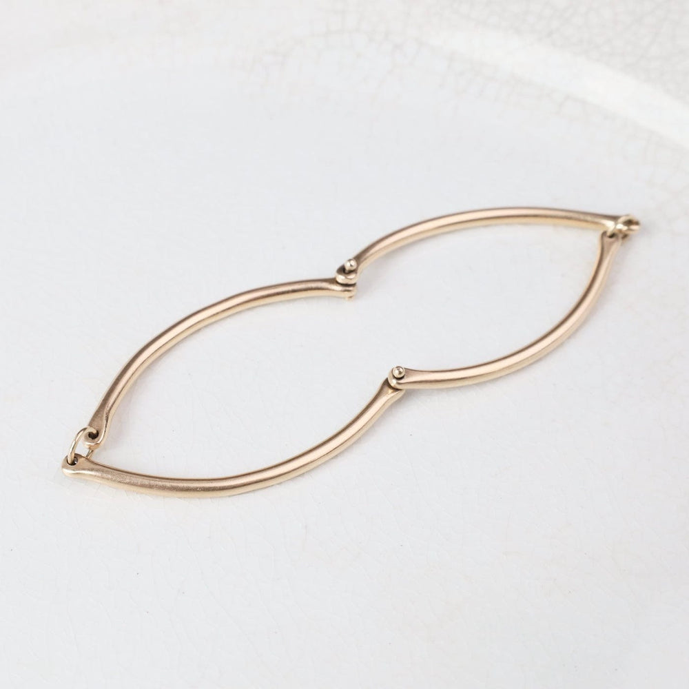 
                  
                    BRC-14K Rivet and Ring Bangle
                  
                