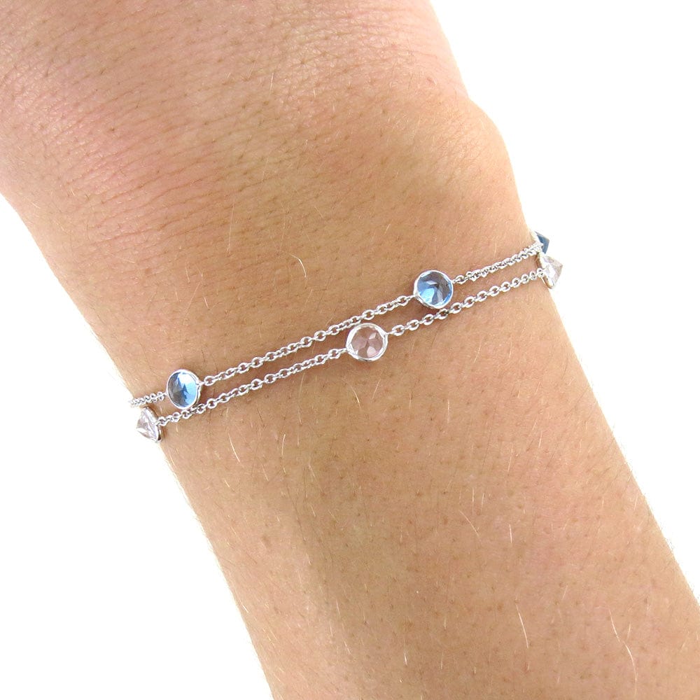 BRC-14K WHITE TOPAZ BRACELET