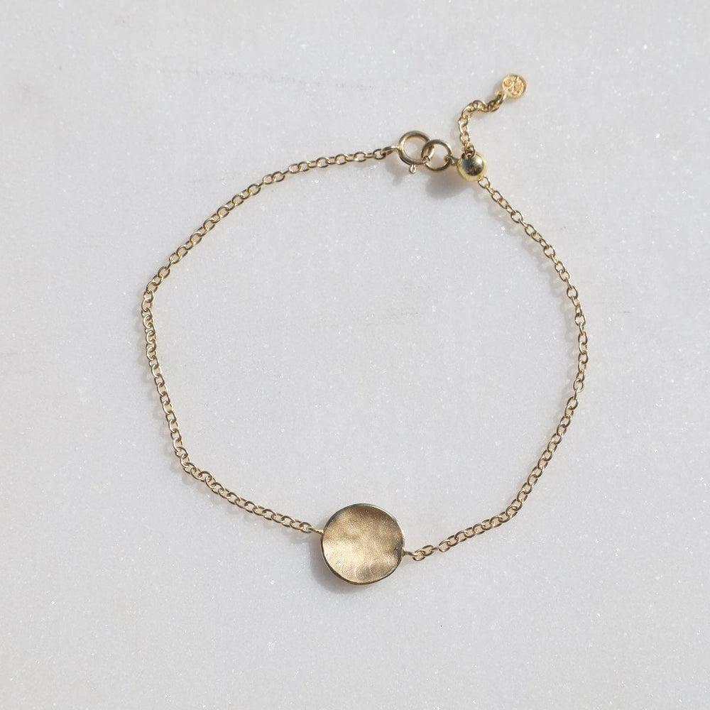 
                      
                        BRC-18K 18k Hammered Disk Bracelet
                      
                    