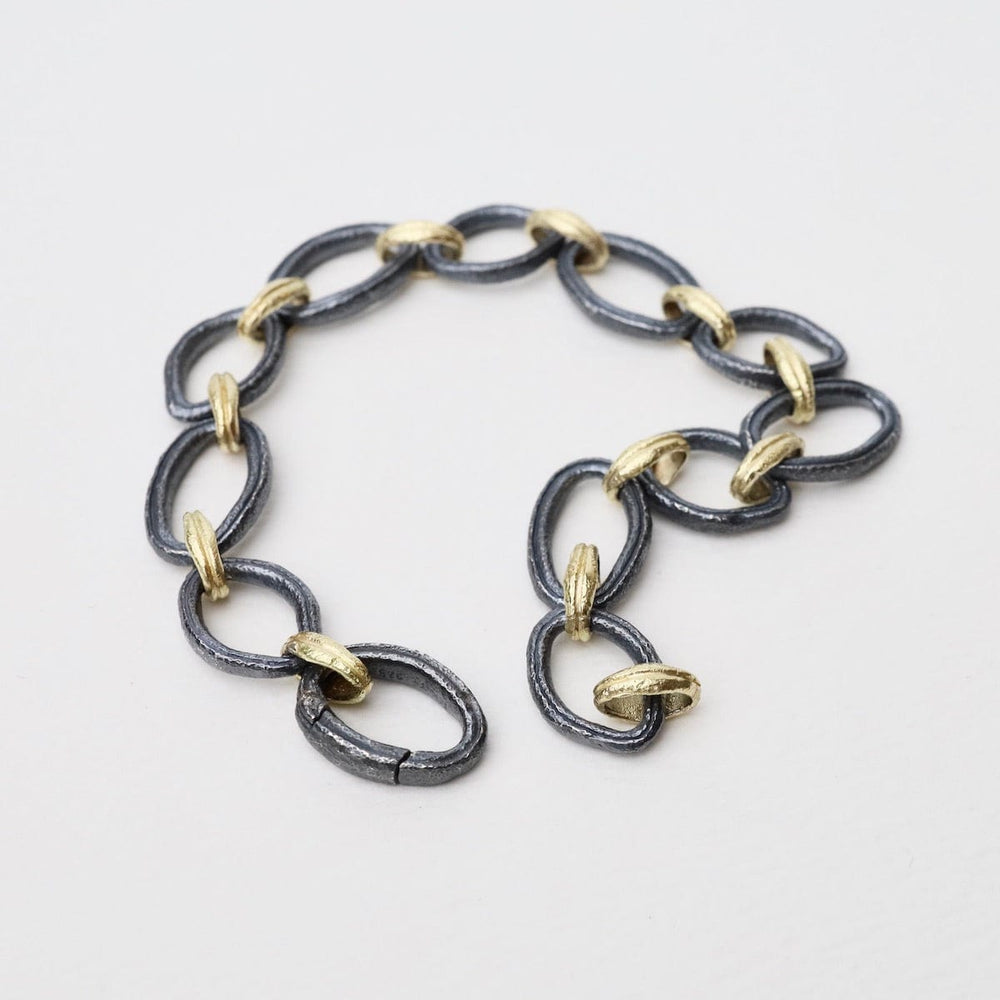 
                  
                    BRC-18K 18k Yellow Gold & Oxidized Sterling Silver Bracelet
                  
                