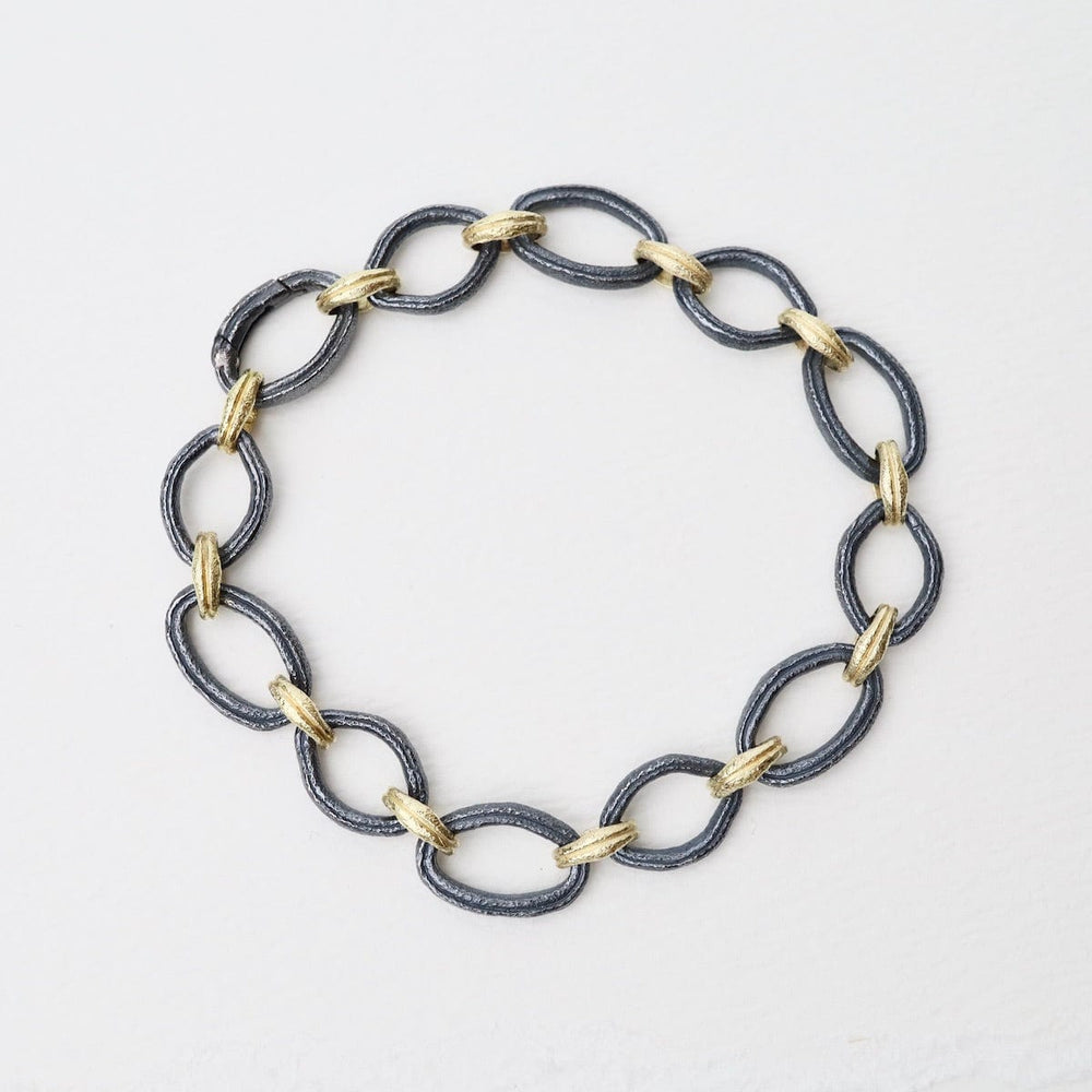 
                  
                    BRC-18K 18k Yellow Gold & Oxidized Sterling Silver Bracelet
                  
                