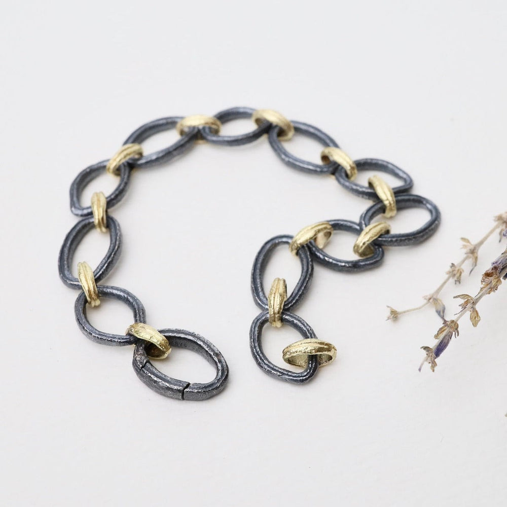 
                  
                    BRC-18K 18k Yellow Gold & Oxidized Sterling Silver Bracelet
                  
                