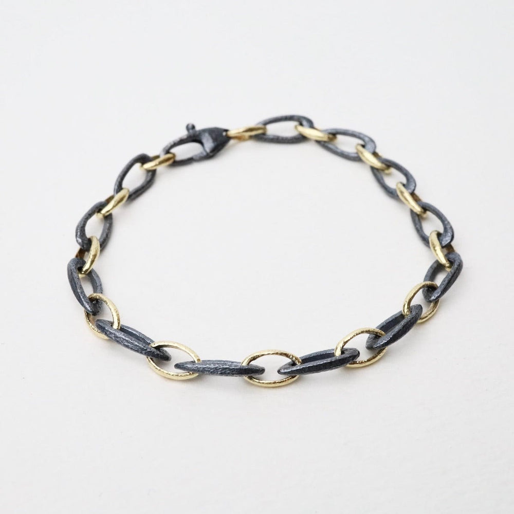 
                  
                    BRC-18K 18k Yellow Gold & Oxidized Sterling Silver Small Organic Link Bracelet
                  
                