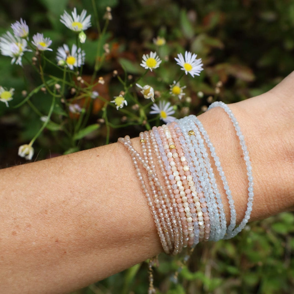 
                      
                        BRC-18K Aquamarine Wrap Bracelet & Necklace
                      
                    