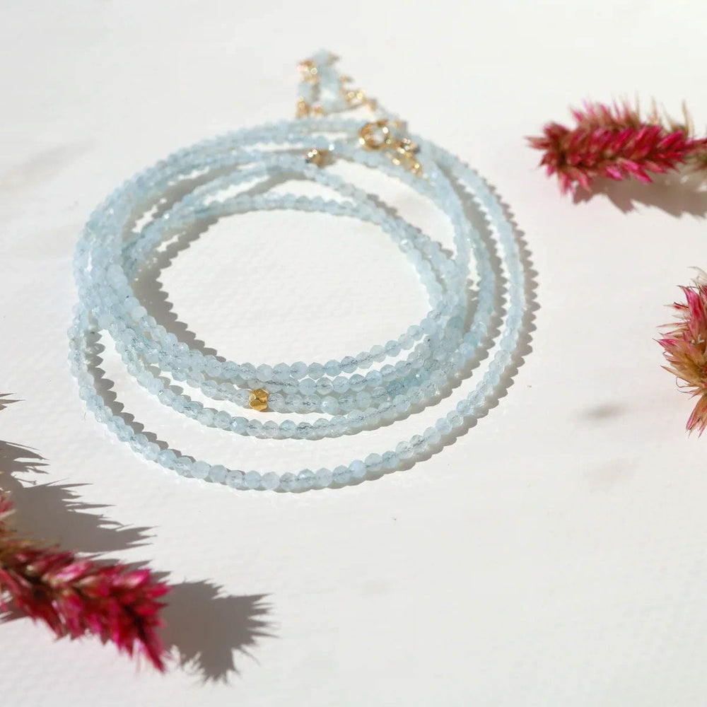 
                      
                        BRC-18K Aquamarine Wrap Bracelet & Necklace
                      
                    