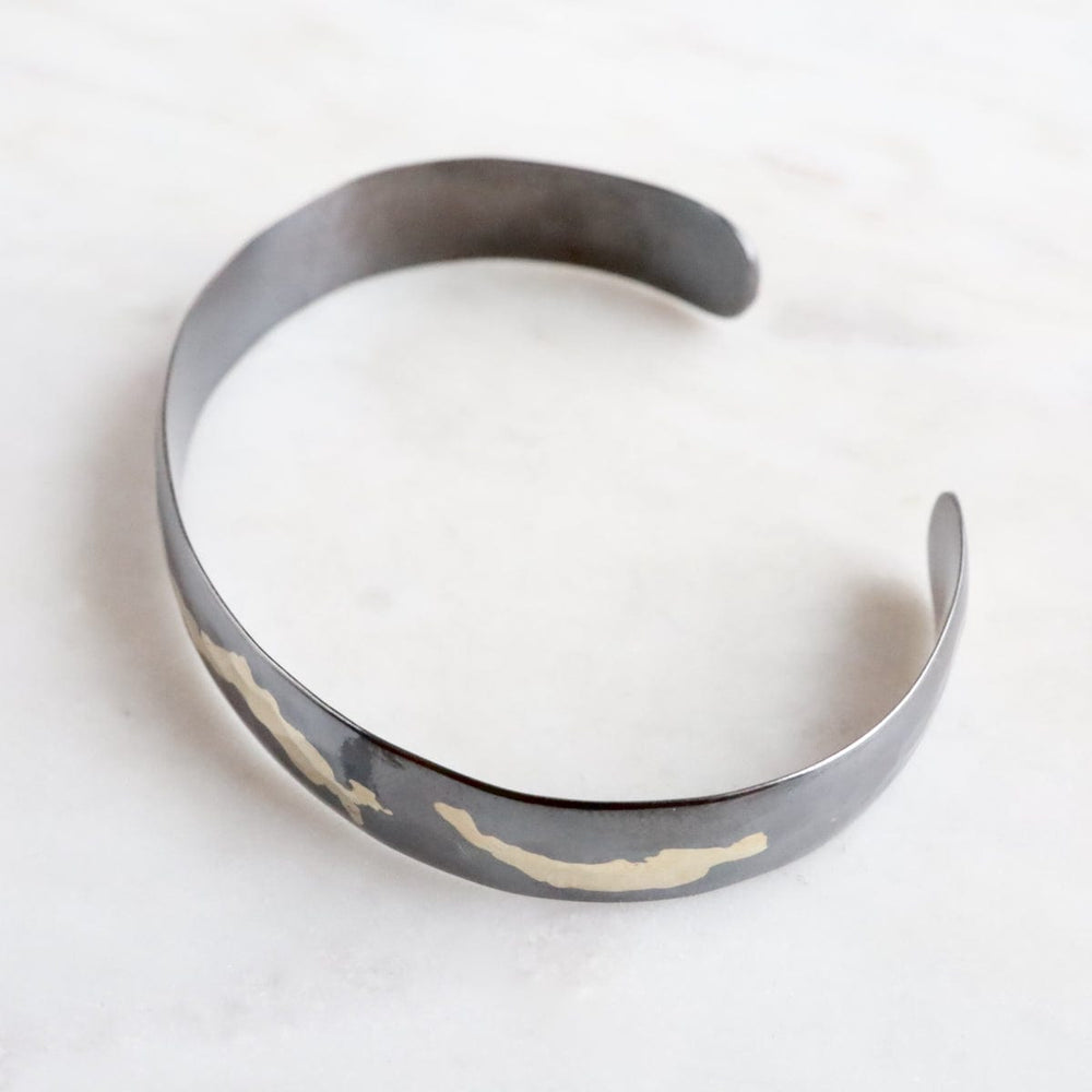 
                  
                    BRC-18K Gilded Cuff Bracelet
                  
                