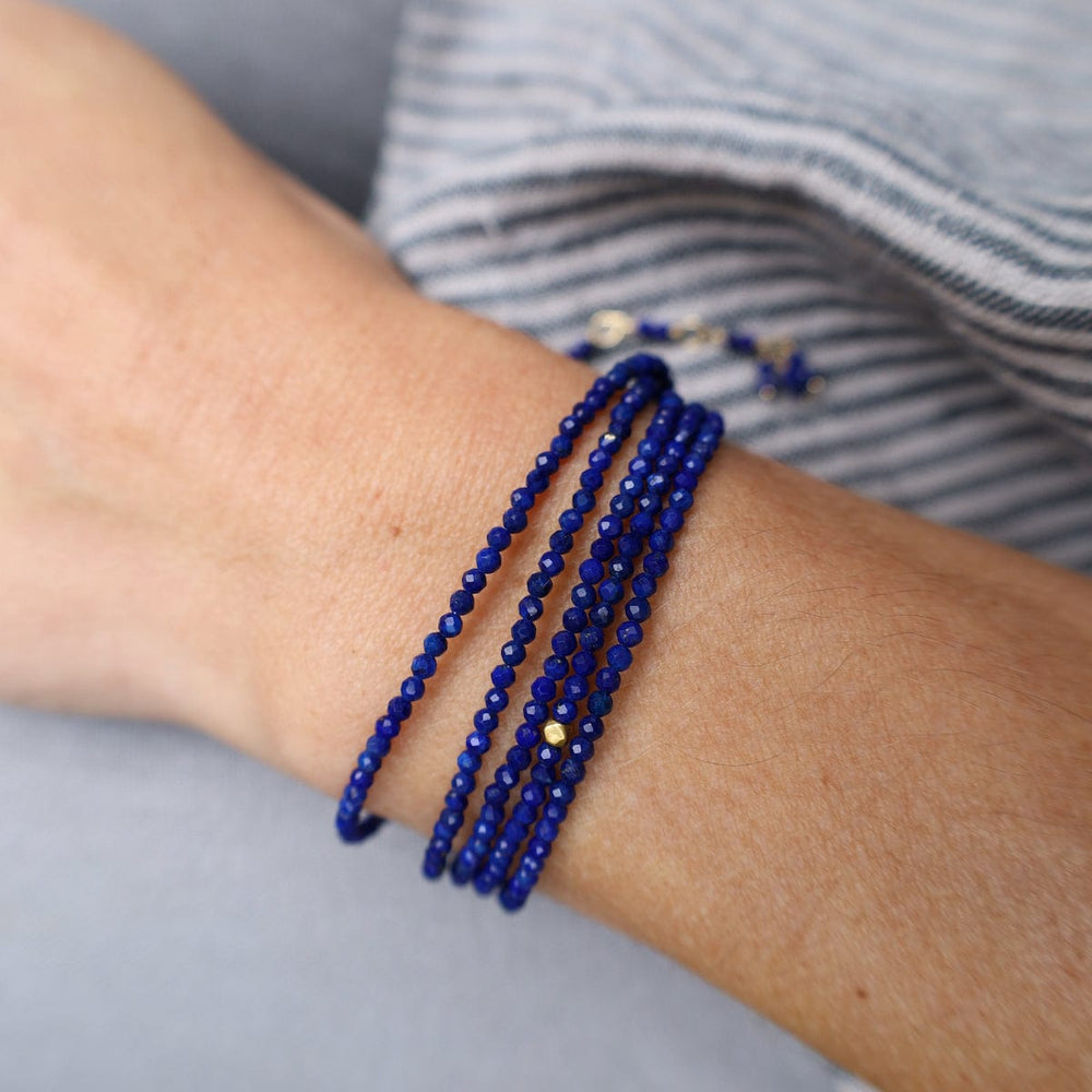 
                      
                        BRC-18K Lapis Wrap Bracelet & Necklace
                      
                    