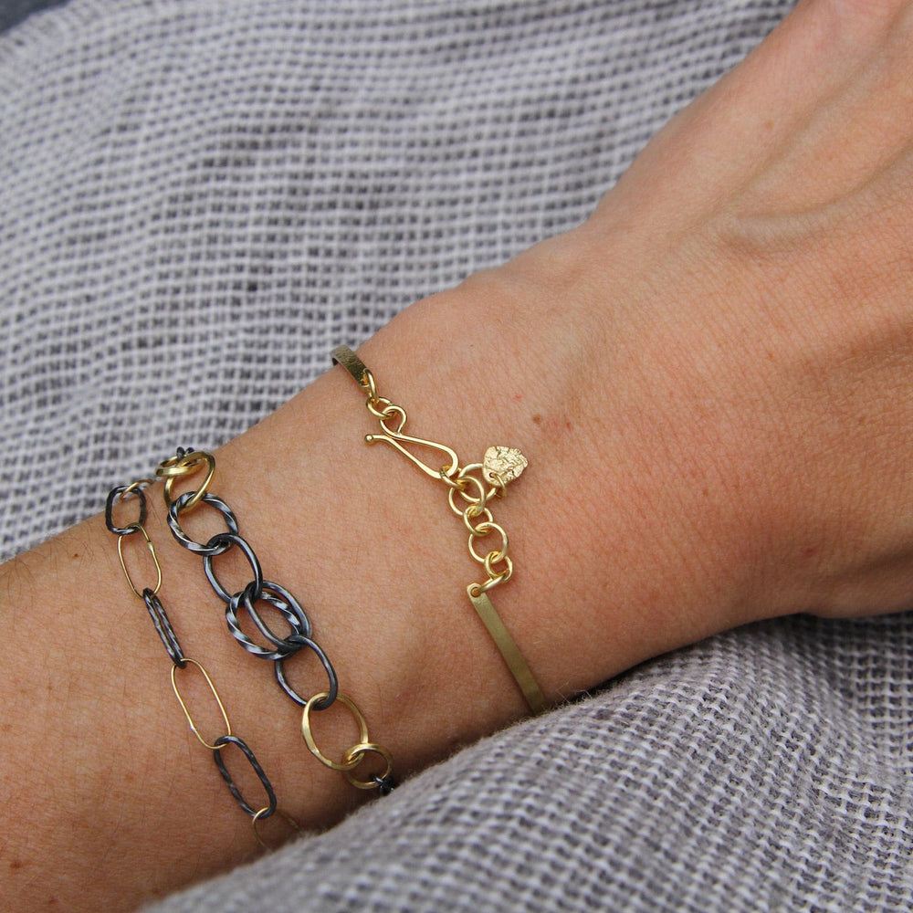 
                      
                        BRC-18K Petite Wrought Links Bracelet
                      
                    