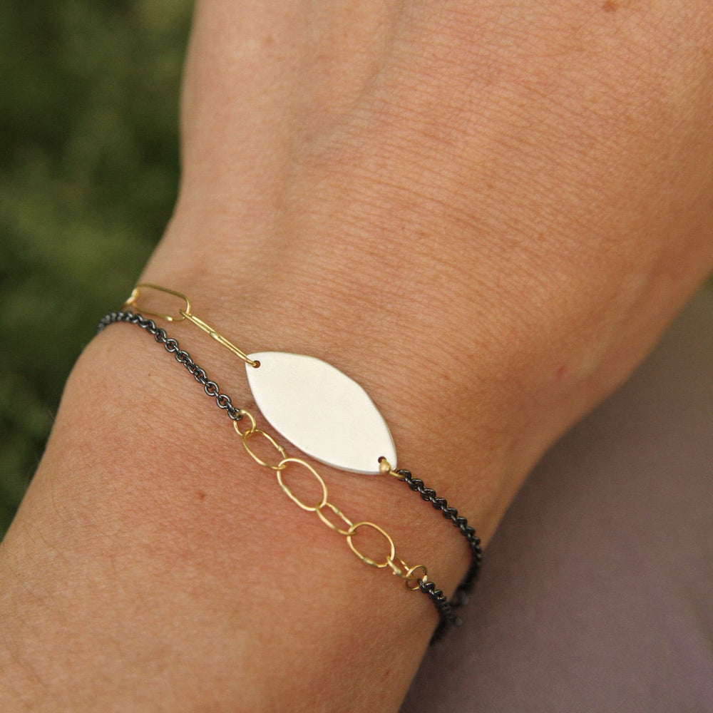 
                  
                    BRC-18K Two Tone Babble Bracelet
                  
                