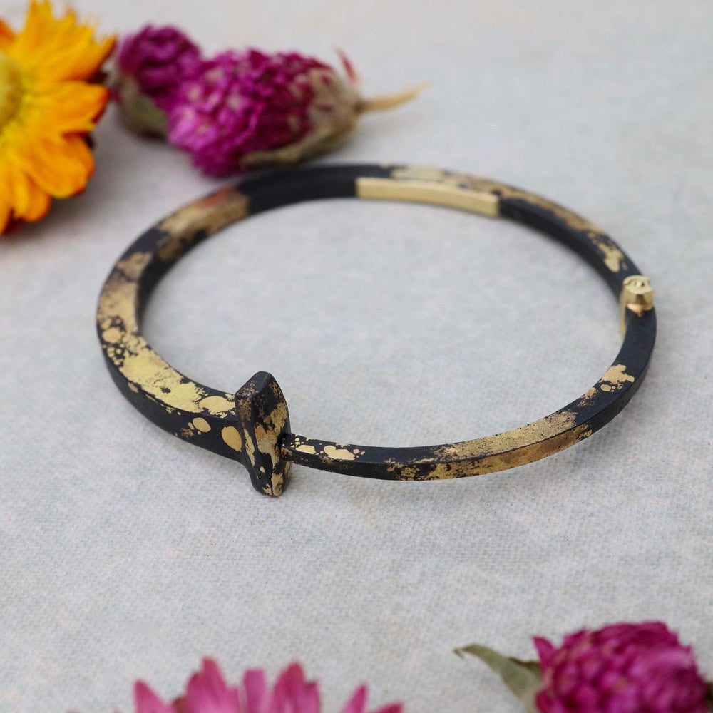 
                  
                    BRC-22K Pat Flynn Iron Nail Bracelet with 22k Yellow Gold Dust
                  
                