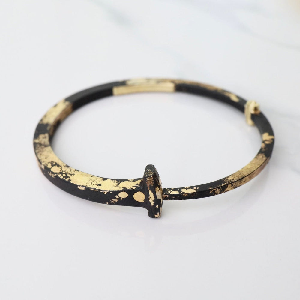 
                      
                        BRC-22K Pat Flynn Iron Nail Bracelet with 22k Yellow Gold Dust
                      
                    