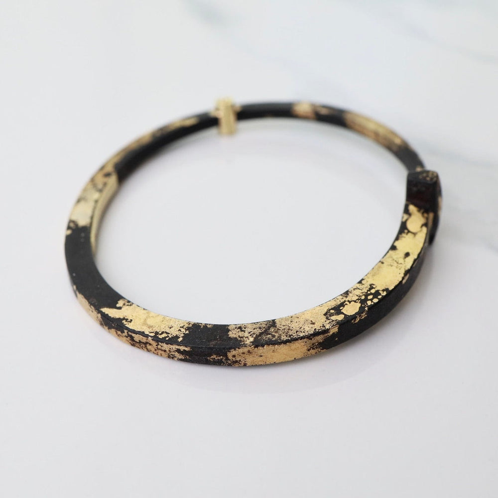 
                      
                        BRC-22K Pat Flynn Iron Nail Bracelet with 22k Yellow Gold Dust
                      
                    