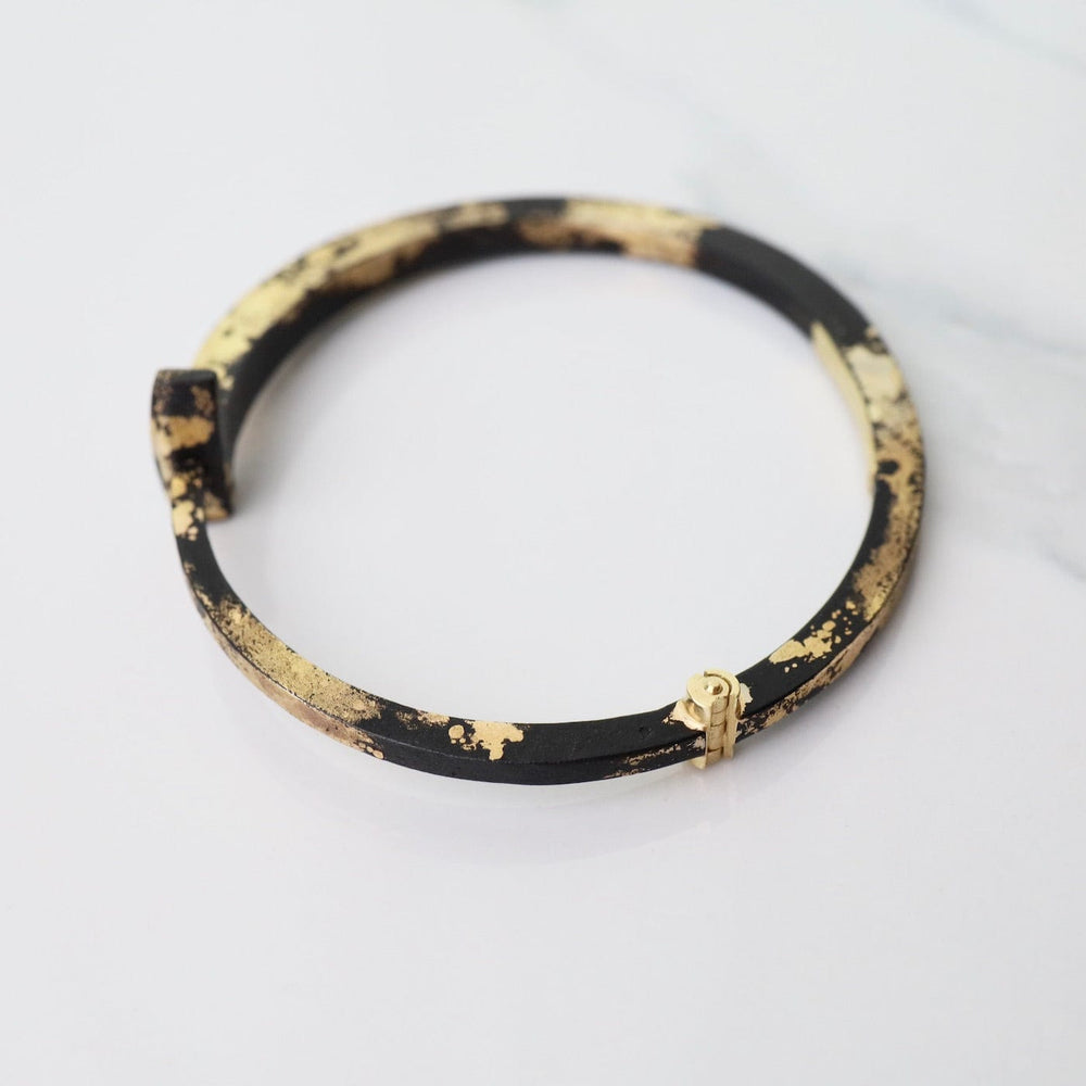 
                  
                    BRC-22K Pat Flynn Iron Nail Bracelet with 22k Yellow Gold Dust
                  
                