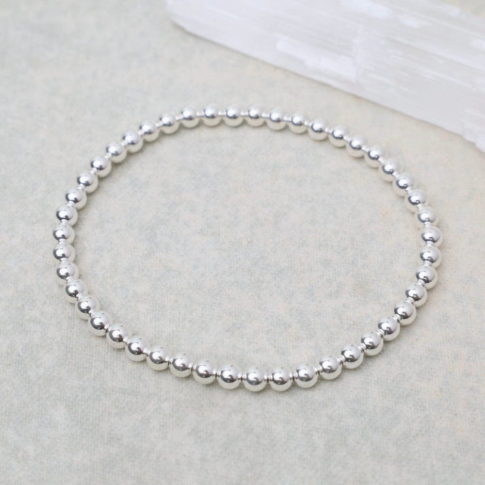 
                      
                        BRC 4mm Classic Ball Bracelet in Silver, Gold, or Two Tone
                      
                    